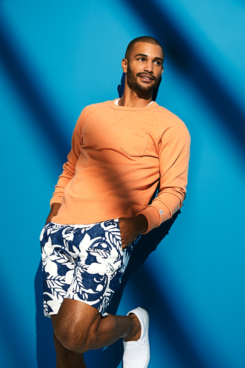 Embracing summer style, Nathan Owens wears Todd Snyder x Reyn Spooner's blue floral shorts $128.