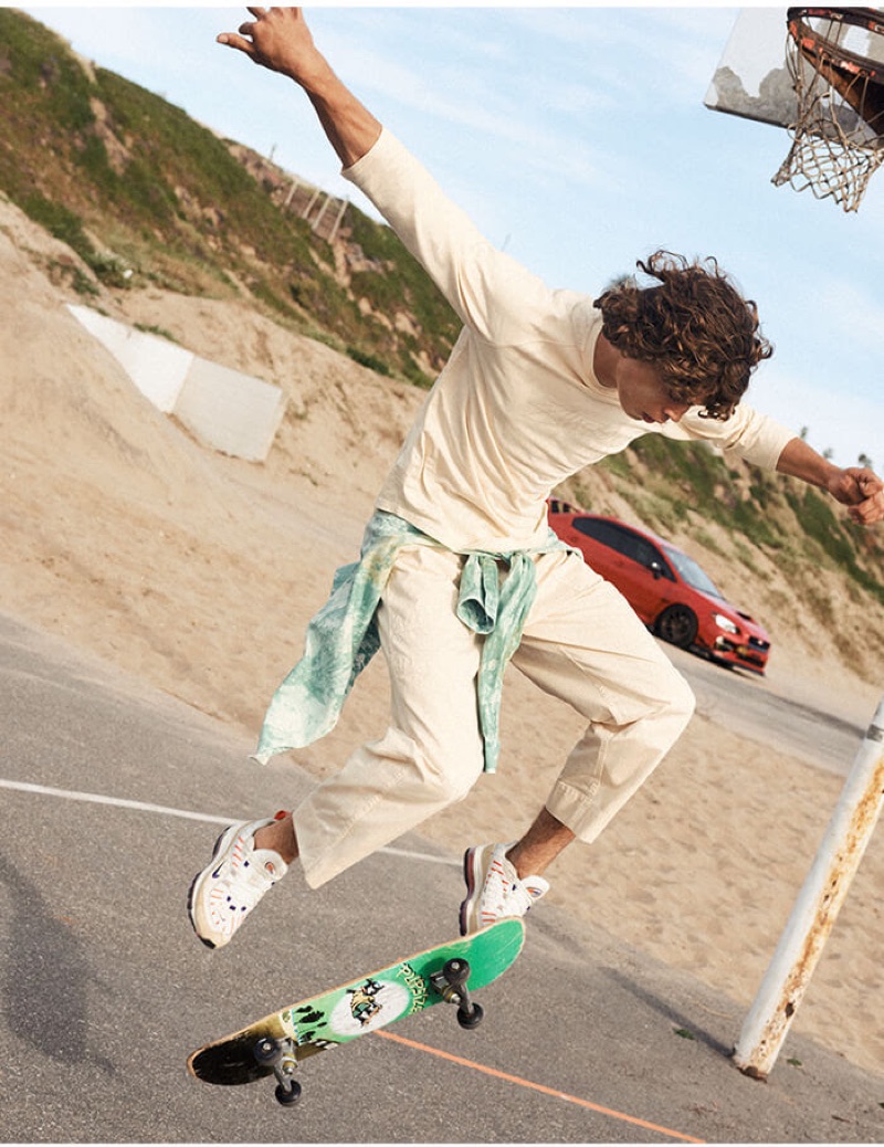 Embracing skater style, Lucas Bin wears a Comme des Garçons shirt tie around his waist.