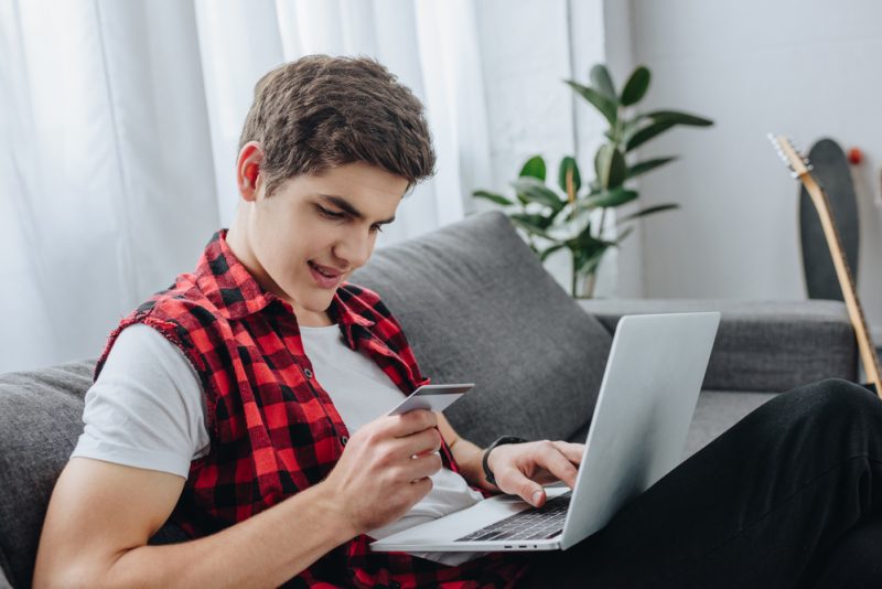 Young Man Shopping Online