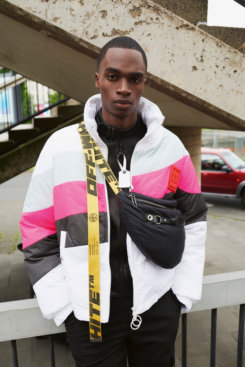 Going sporty, Bakay Diaby wears an Off-White Jacket and belt bag with 7 For All Mankind pants.