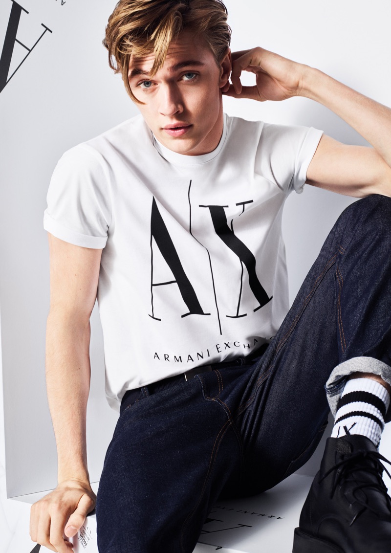 Rocking a logo t-shirt, Lucky Blue Smith fronts Armani Exchange's fall-winter 2019 campaign.