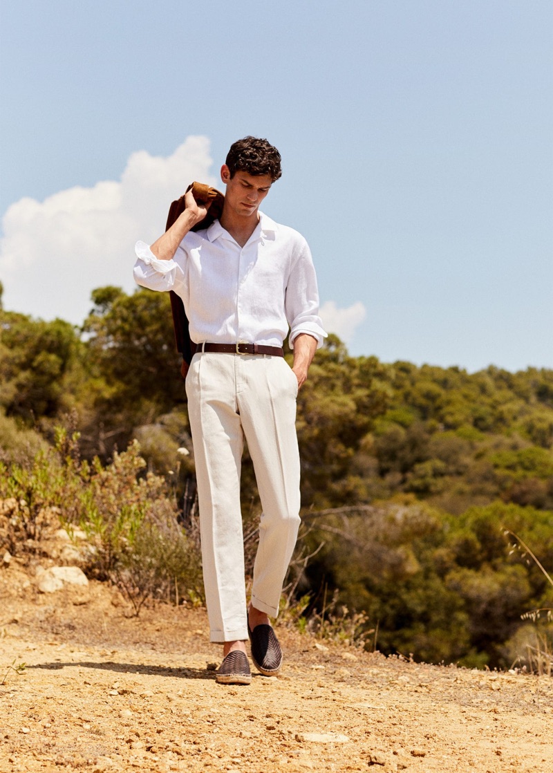 Embracing neutrals, Arthur Gosse dons a sophisticated Mango Man ensemble. 