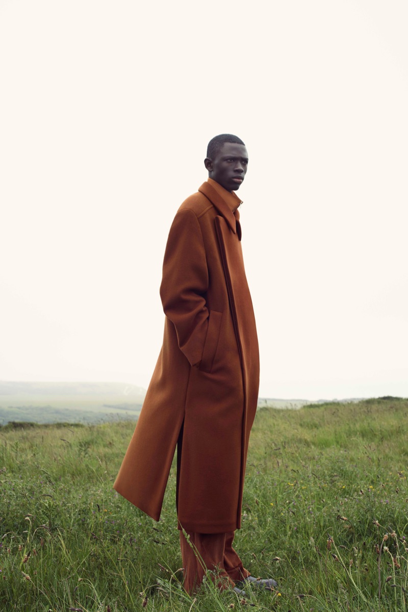 Photographed in the English countryside, Khadim Sock stars in COS' fall-winter 2019 campaign.