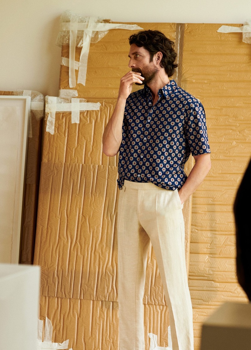 Dressed for the season, Cédric Bihr sports a printed short-sleeve shirt with linen pants by Mango Man.