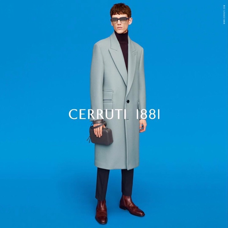 Xavier Gibson dons a long tailored coat for Cerruti 1881's fall-winter 2019 campaign.