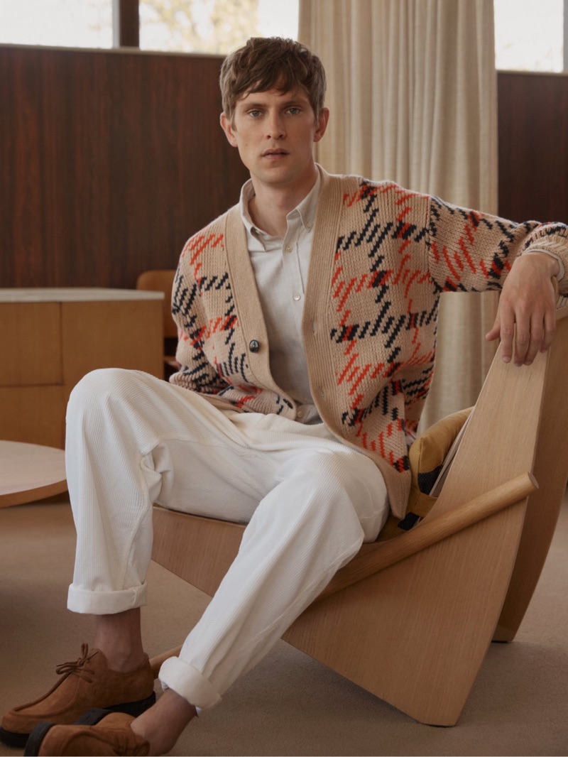 Sporting a cardigan sweater, Mathias Lauridsen stars in Closed's fall-winter 2019 campaign.