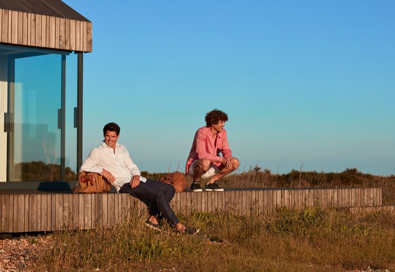 Models William Goodge and Max Rogers don summer fashions by Derek Rose.