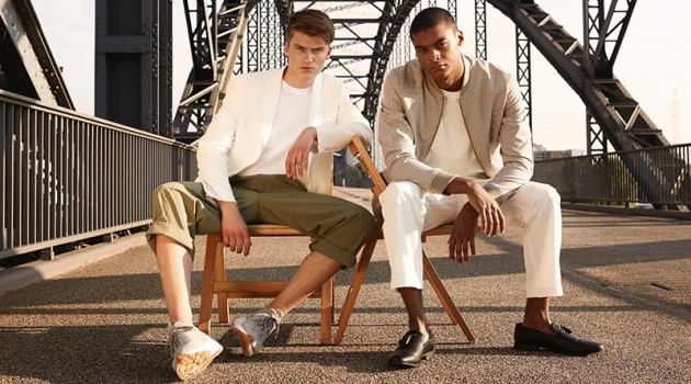 Leon Füssel, Eugon McNeil & Aaron Kollien in 'The Bridge' Left to Right: Leon wears jacket ZARA, t-shirt H&M, trousers Weekday, and sneakers EKN footwear. Eugon wears jacket Reserved, t-shirt H&M, trousers Weekday, and shoes ASOS.