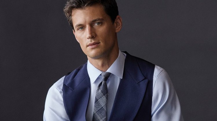 Front and center, Garrett Neff models a shirt, waistcoat, and tie by Massimo Dutti.