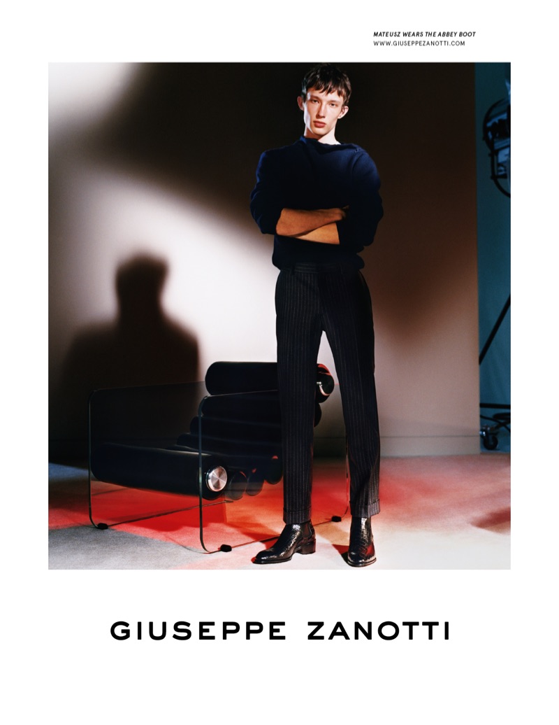 Model Mateusz Chmielewski fronts Giuseppe Zanotti's fall-winter 2019 men's campaign.