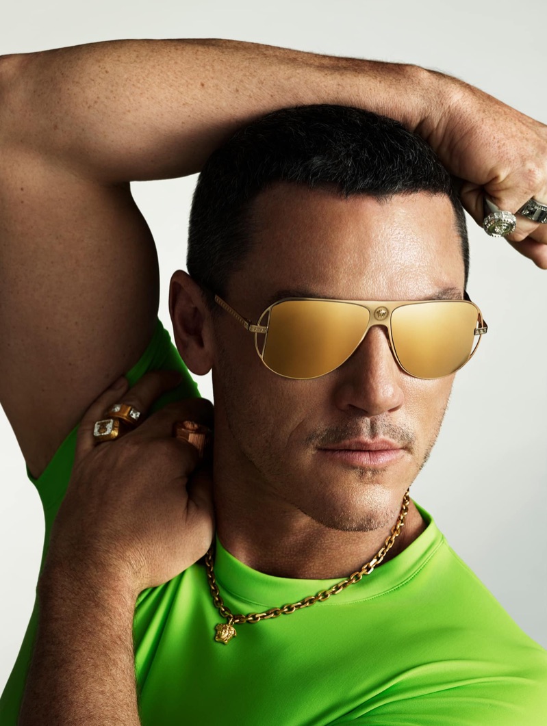 Standing out in Versace accessories, Luke Evans fronts the brand's Grecamania eyewear campaign.