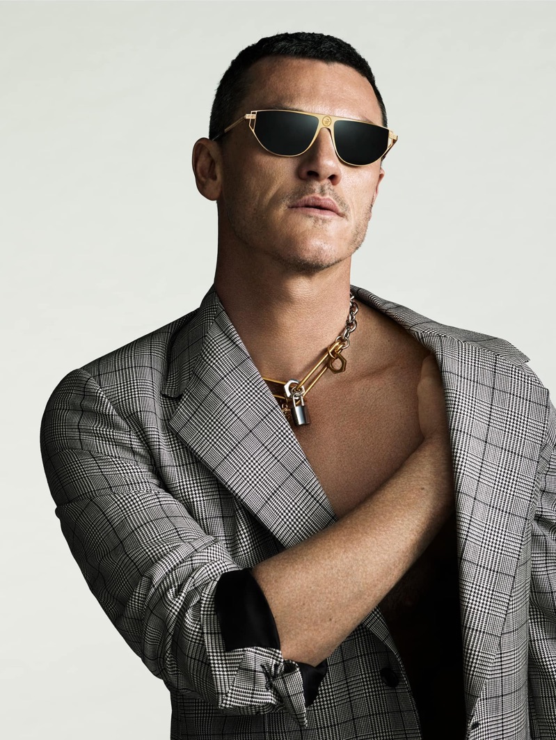 Versace taps Luke Evans as the face of its Grecamania eyewear campaign.