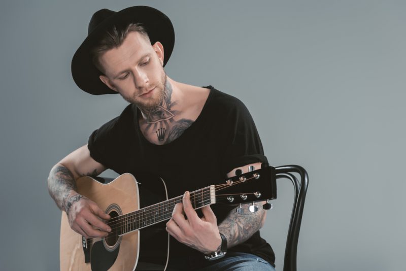 Man Tattoos Playing Guitar » How to Choose a Tattoo: 6 Things to Consider Man Tattoos Playing Guitar