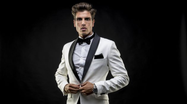 How to Navigate Contemporary Casino Style Male Model White Tuxedo Jacket Black Bow-Tie