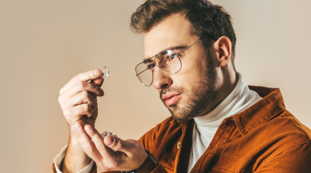 6 Interesting Facts You Didn't Know about Diamonds Man Looking at Diamond
