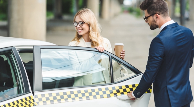 Old-Fashioned Etiquette Rules We Should Bring Back Man Opening Door for Woman