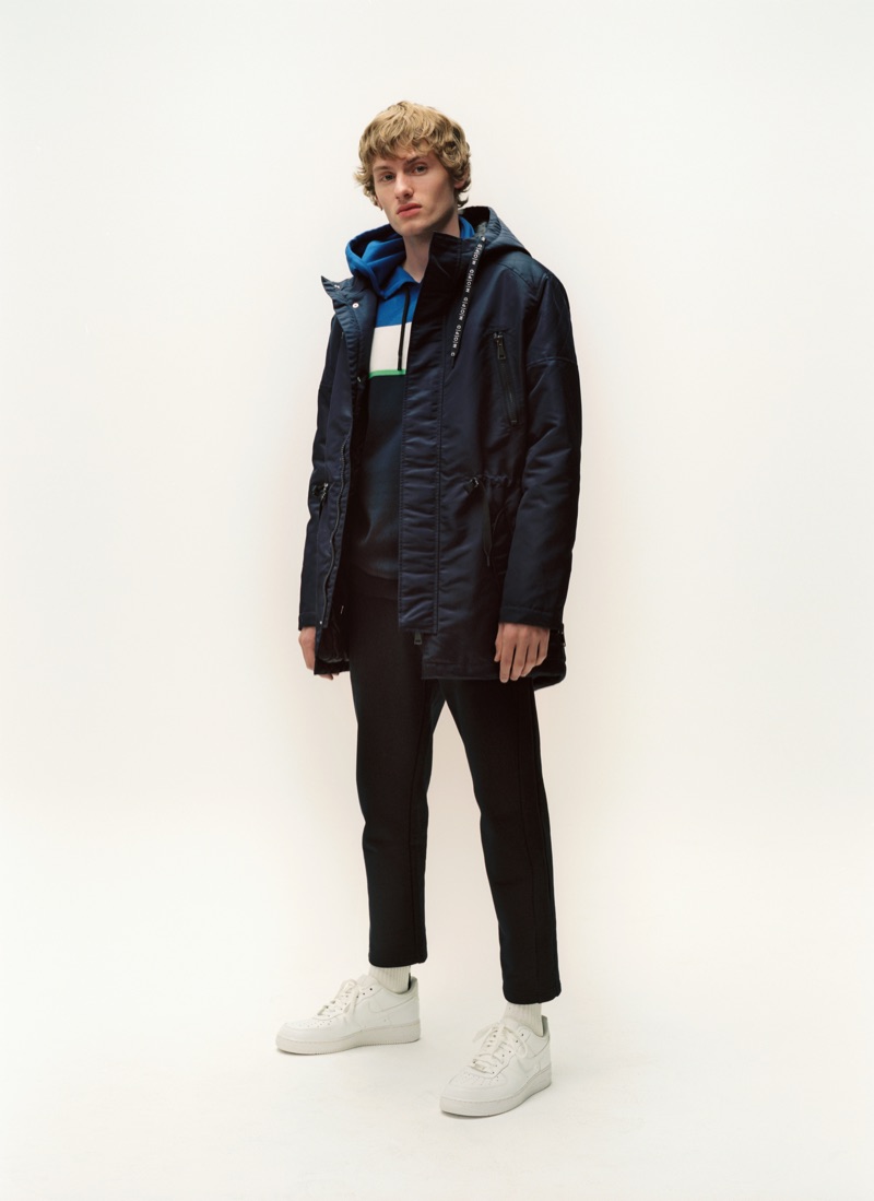 Front and center, Lemmie van den Berg dons a parka and denim from Marc O'Polo.