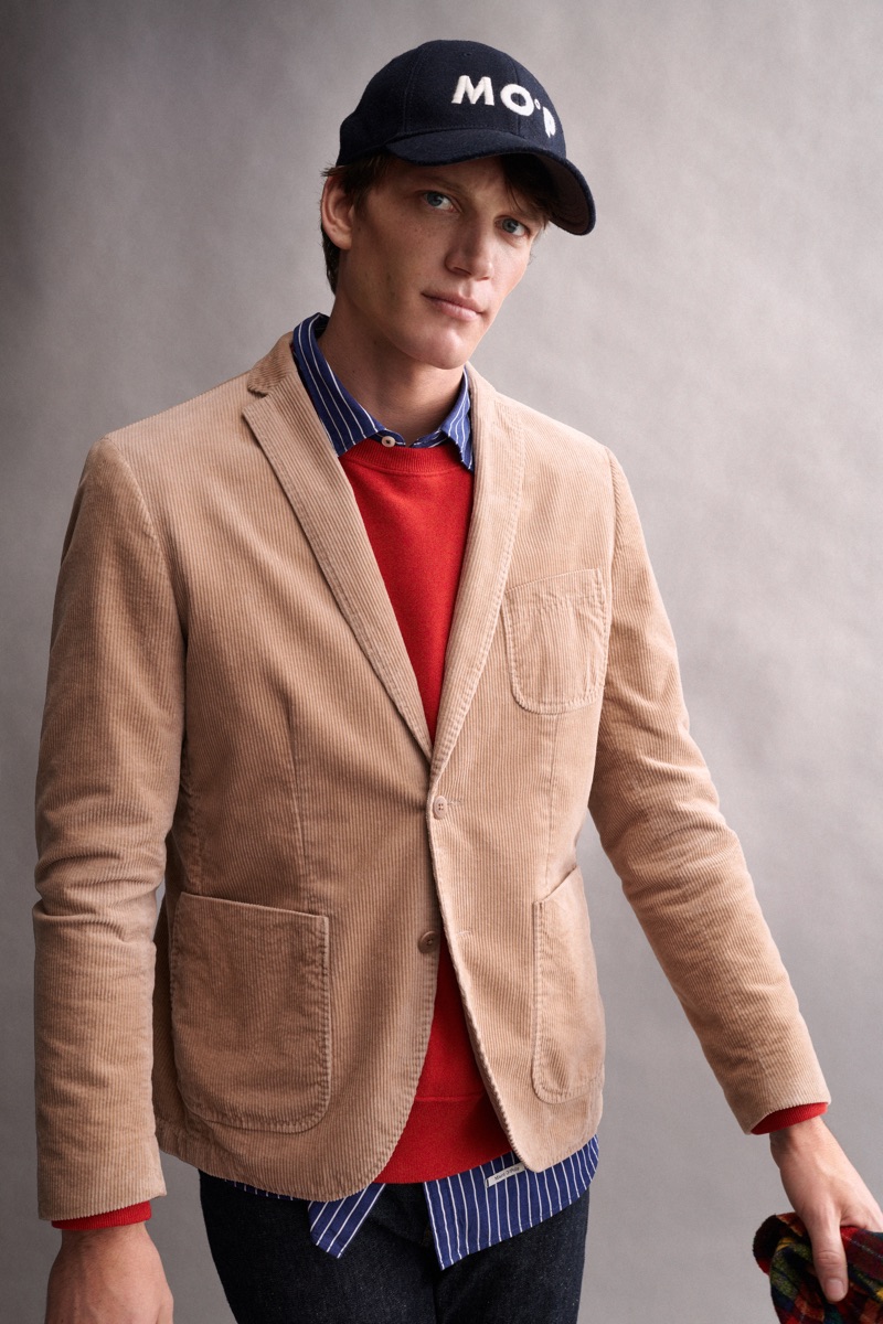 A smart vision, Florian Van Bael dons a corduroy blazer from Marc O'Polo.