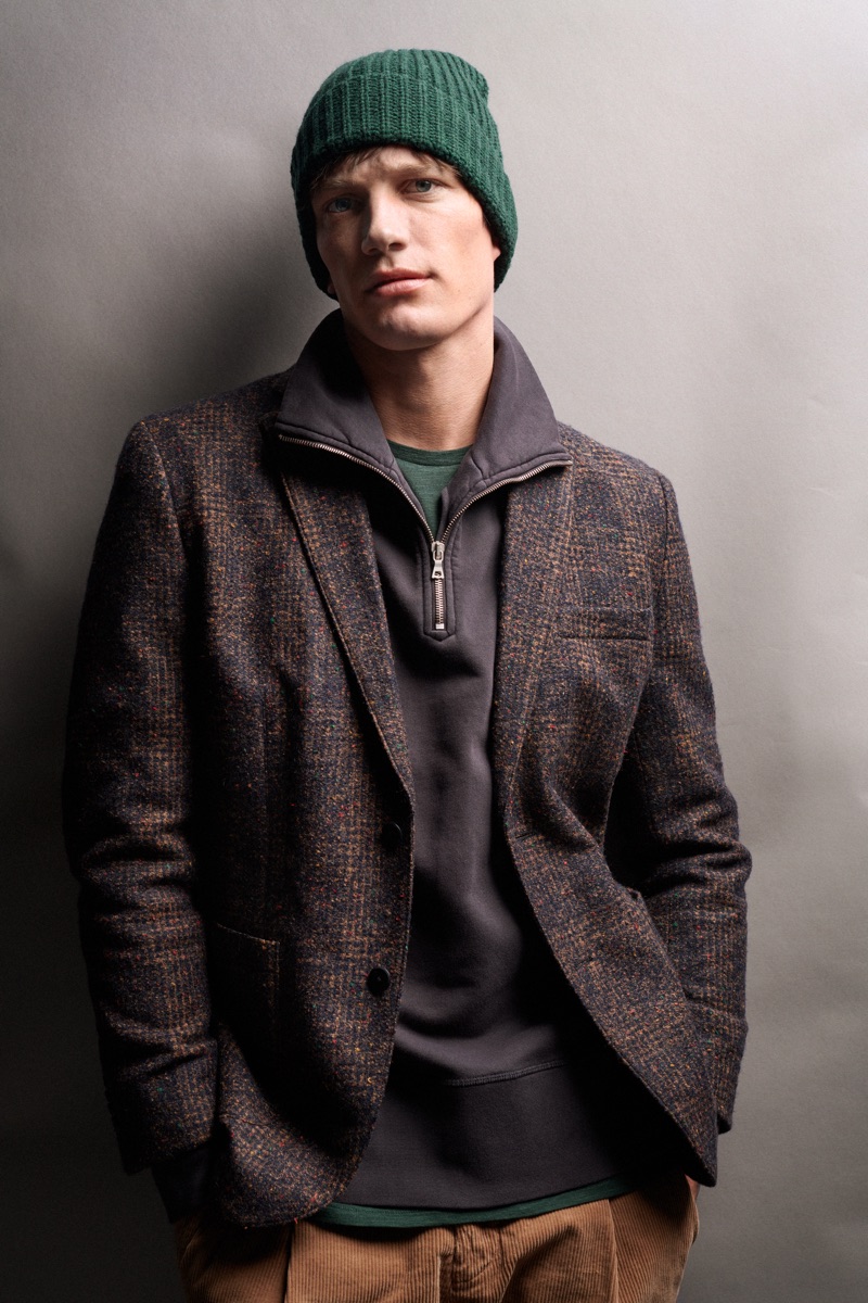 Embracing an autumnal color palette, Florian Van Bael wears Marc O'Polo.