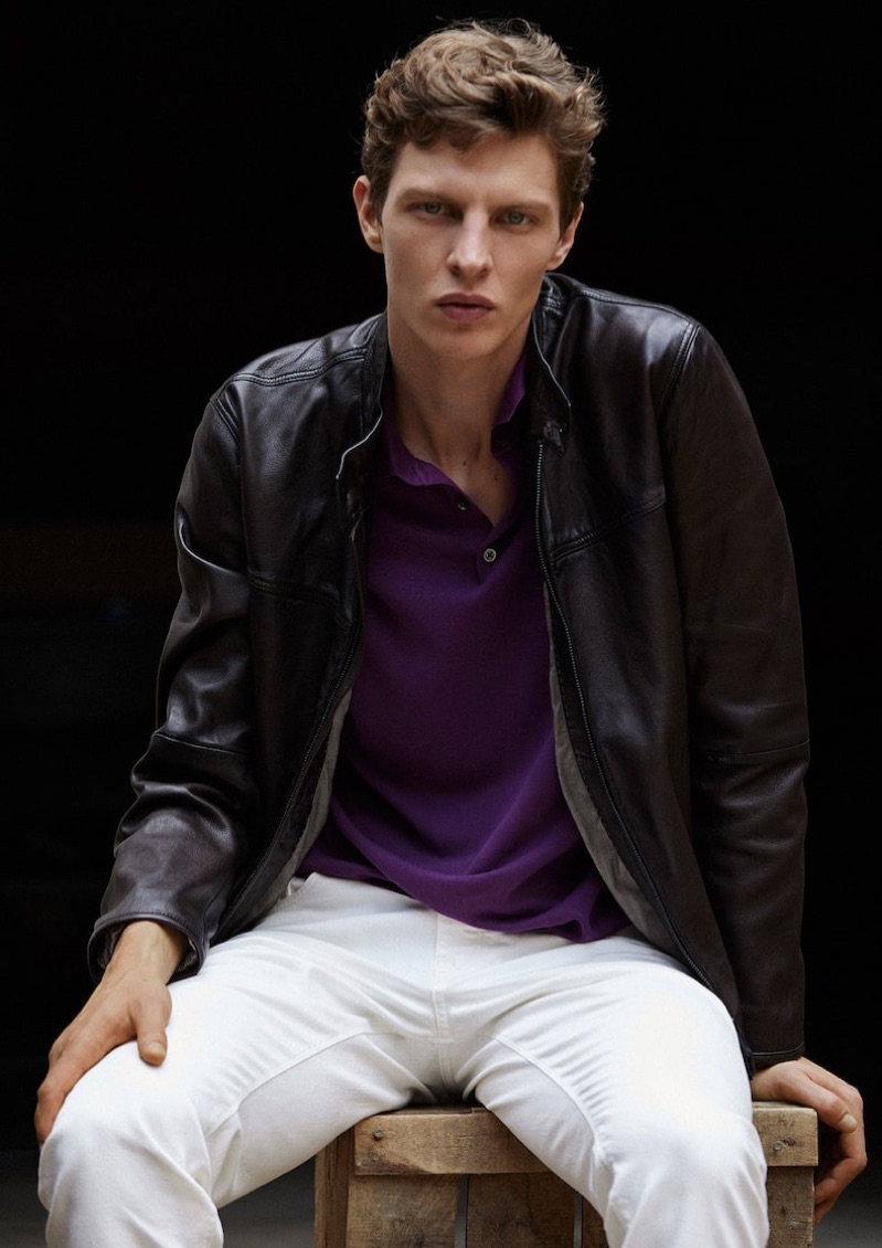 Embracing a splash of purple with a polo, Tim Schuhmacher sports a look by Massimo Dutti.