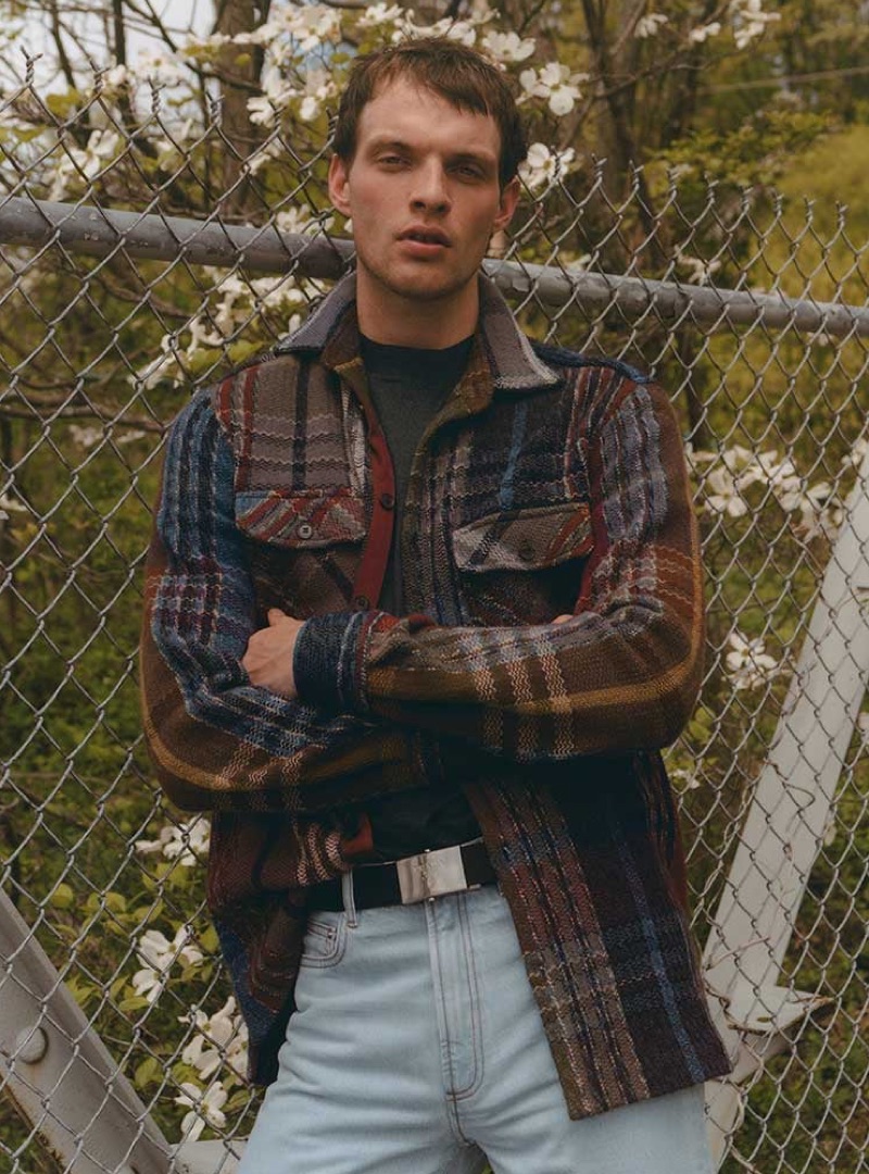 Embracing a flair for the outdoors, Rocky Harwood sports a Missoni shirt, Lanvin t-shirt, A.P.C. jeans, and Prada belt.