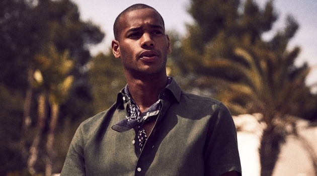 Sacha M'Baye Travels to the Balearic Islands with Reiss Sacha M'Baye dons chic summer style from Reiss.