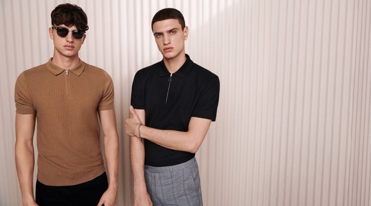 Smart style is front and center as Romain Hamdous and Azim Osmani wear zippered polos with trousers by Topman.