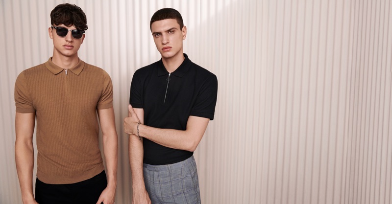 Smart style is front and center as Romain Hamdous and Azim Osmani wear zippered polos with trousers by Topman.