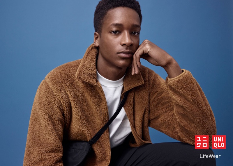 Jesajah Gemin dons a brown fleece jacket for the UNIQLO LifeWear fall-winter 2019 men's campaign.