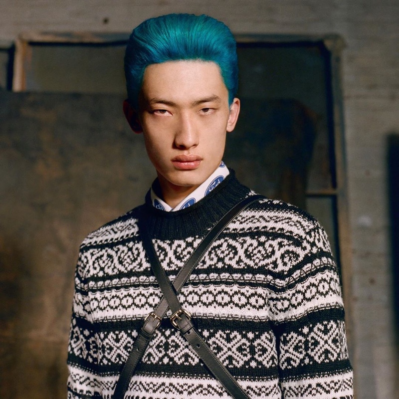 Rocking blue hair, Hang Yu fronts Versace's fall-winter 2019 campaign.