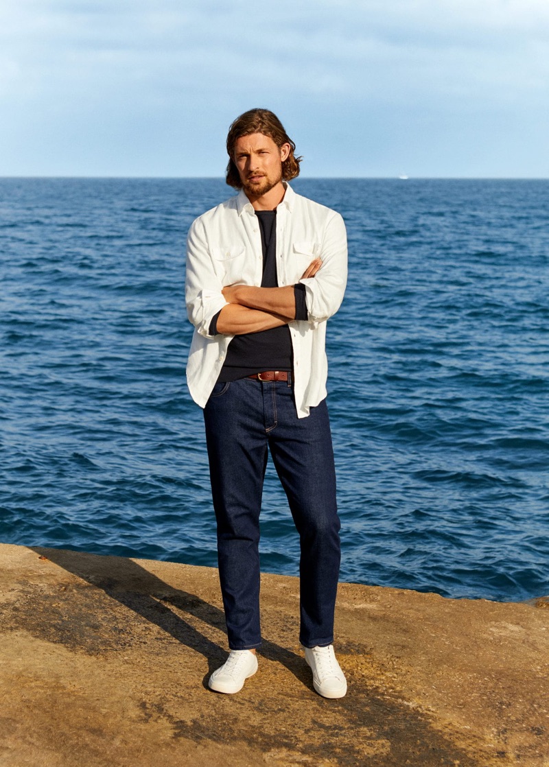 Mango Man taps Wouter Peelen to star in a summer outing, which features key pieces such as dark wash denim and crisp white shirt.