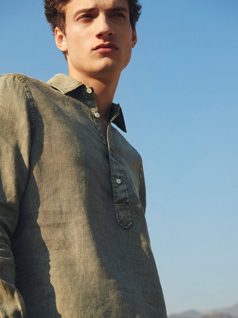 Reuniting with YOOX, Serge Rigvava wears a pullover shirt for summer.