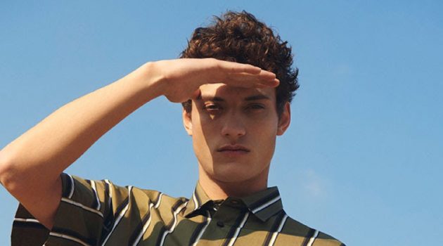 Serge Rigvava Models Summer Shirts for YOOX Serge Rigvava sports a striped short-sleeve shirt by OAMC.