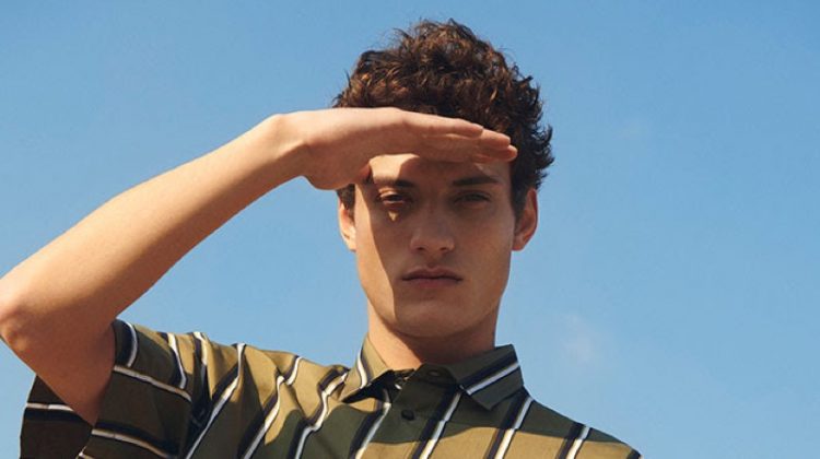 Serge Rigvava sports a striped short-sleeve shirt by OAMC.