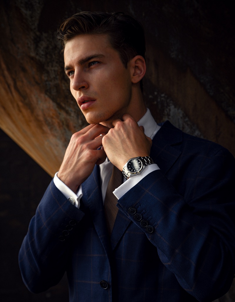 Yulef wears tie BOSS, watch Rolex Oyster Perpetual, and blazer and Hackett London. 