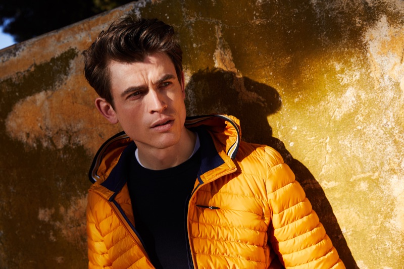 Sporting a yellow quilted jacket, Luc van Geffen fronts s.Oliver Black Label's fall-winter 2019 campaign.