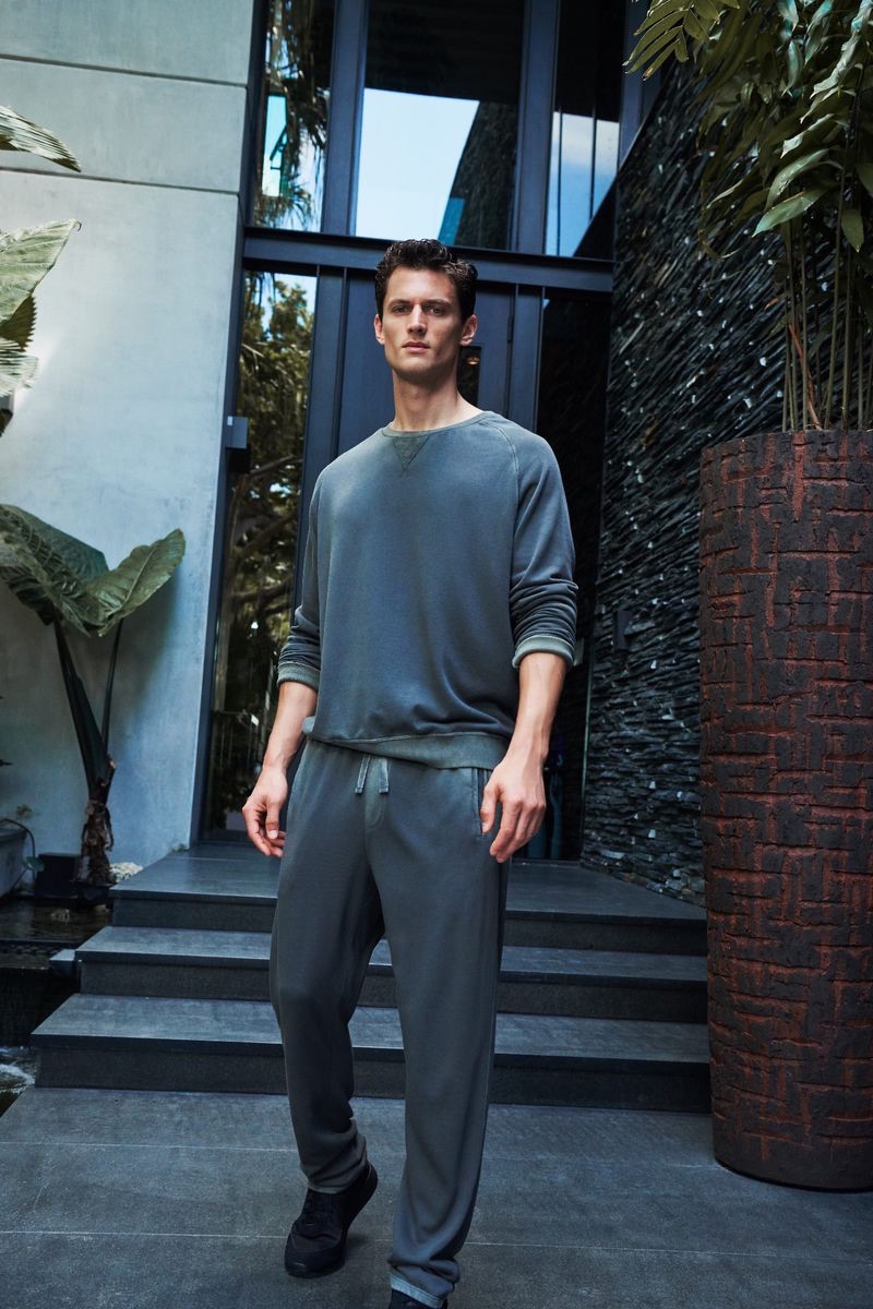 Reuniting with ATM, Garrett Neff sports a monochromatic leisure look.