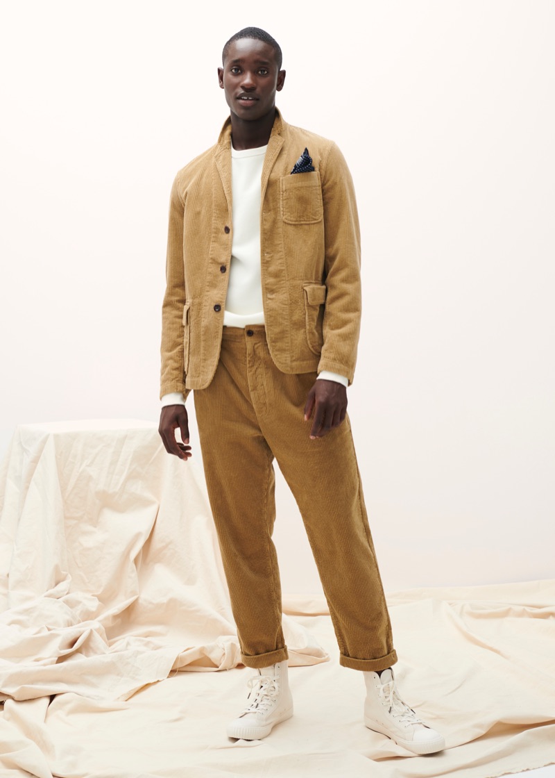 Charles Oduro sports a matching corduroy jacket and pants from Alex Mill's fall 2019 collection.