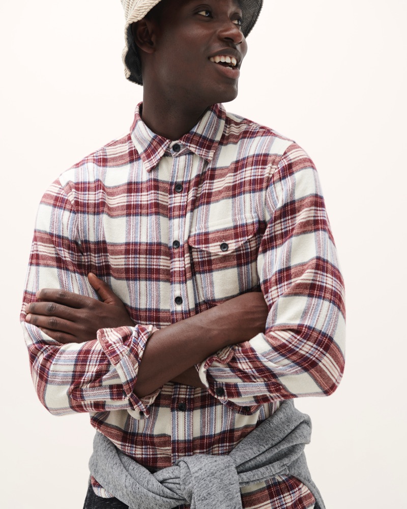 Model Charles Oduro dons a flannel shirt from Alex Mill's fall 2019 collection.