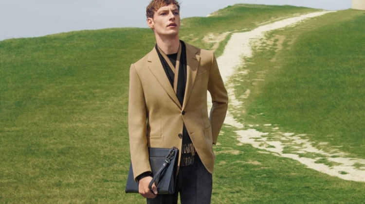 Roberto Sipos dons a tailored look from Ermenegildo Zegna.