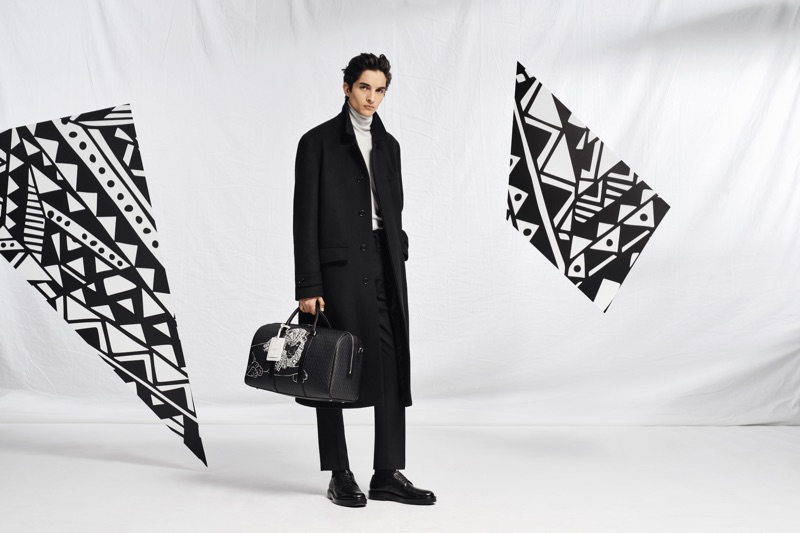 Pablo Fernandez takes hold of a leather carryall from the BOSS x Meissen holiday 2019 capsule collection.