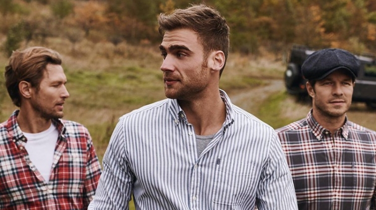 Robertas Aukstuolis, George Alsford, and Paul Sculfor wear tops from Barbour's fall 2019 Shirt Department collection.