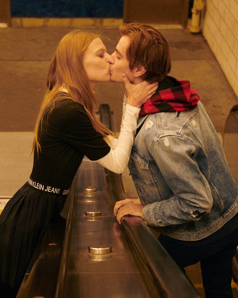 Sharing a kiss, Lexi Boling and Ben Allen front Calvin Klein Jeans' fall-winter 2019 campaign.
