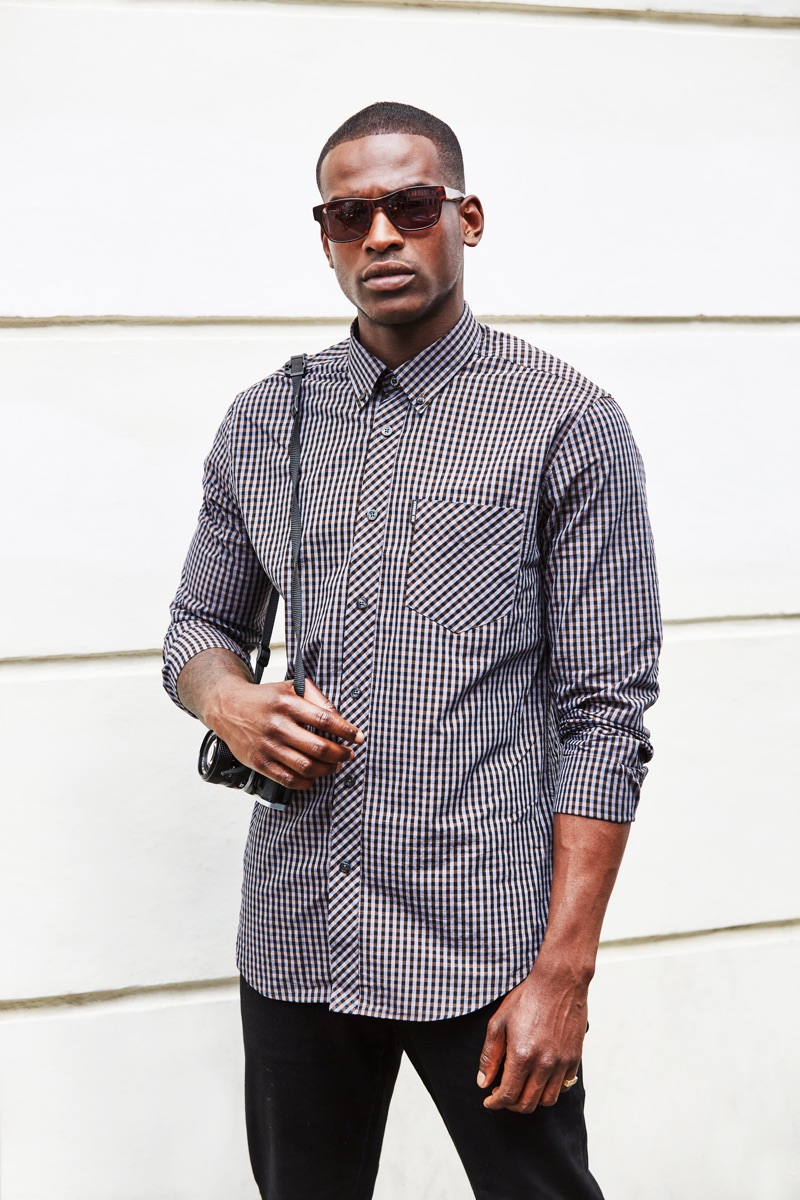 Photographer, DJ, and model Chris Reid goes casual in Ben Sherman.