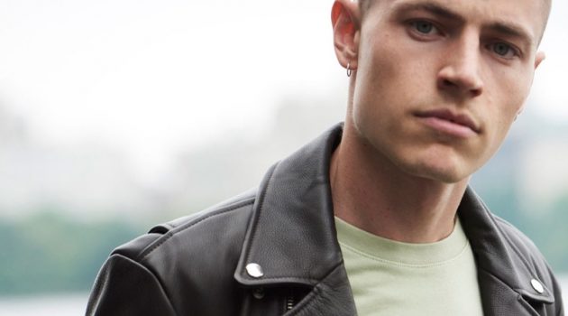 Rocking a leather biker jacket $650, Jonas Kloch dons easy fall fashions from Club Monaco.