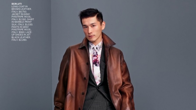 Daisuke Ueda dons a sleek brown leather coat with a grey pinstripe suit by Berluti.