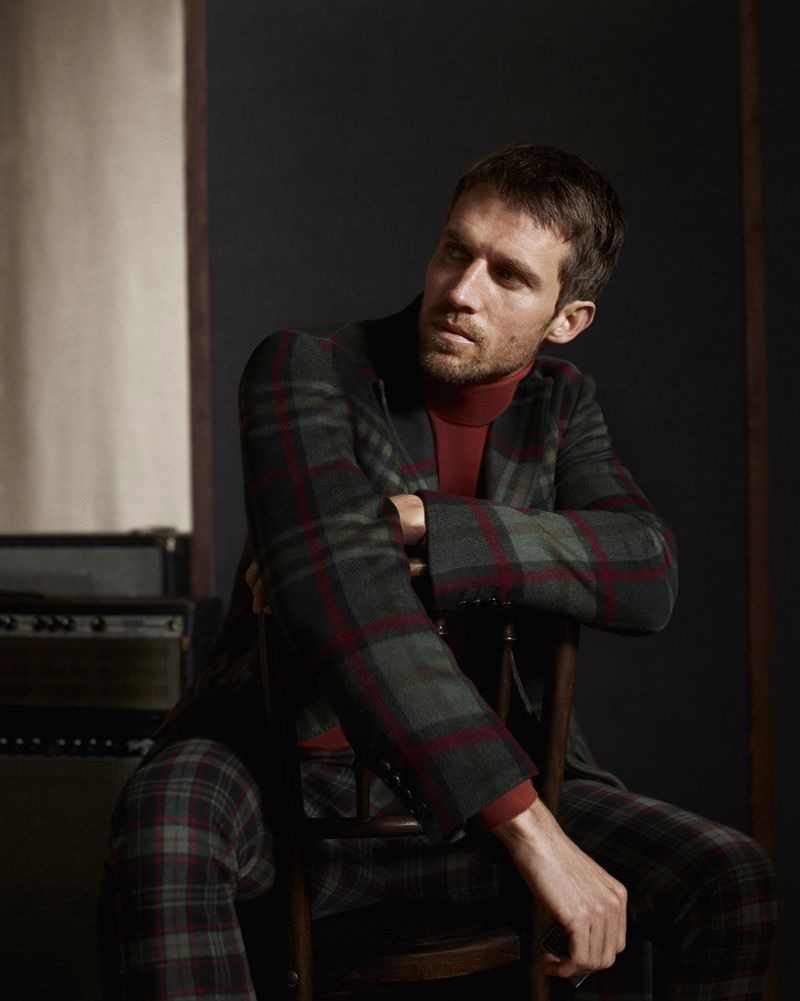 Donning tartan, Andrew Cooper appears in Daks' fall-winter 2019 campaign.