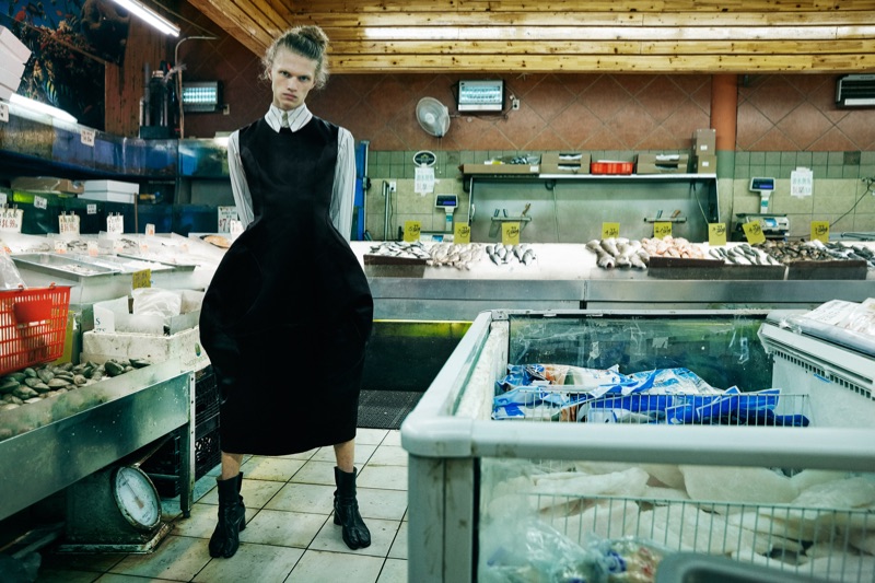 Finlay wears shirt Vivienne Westwood, dress Comme des Garçons, and boots Maison Margiela.