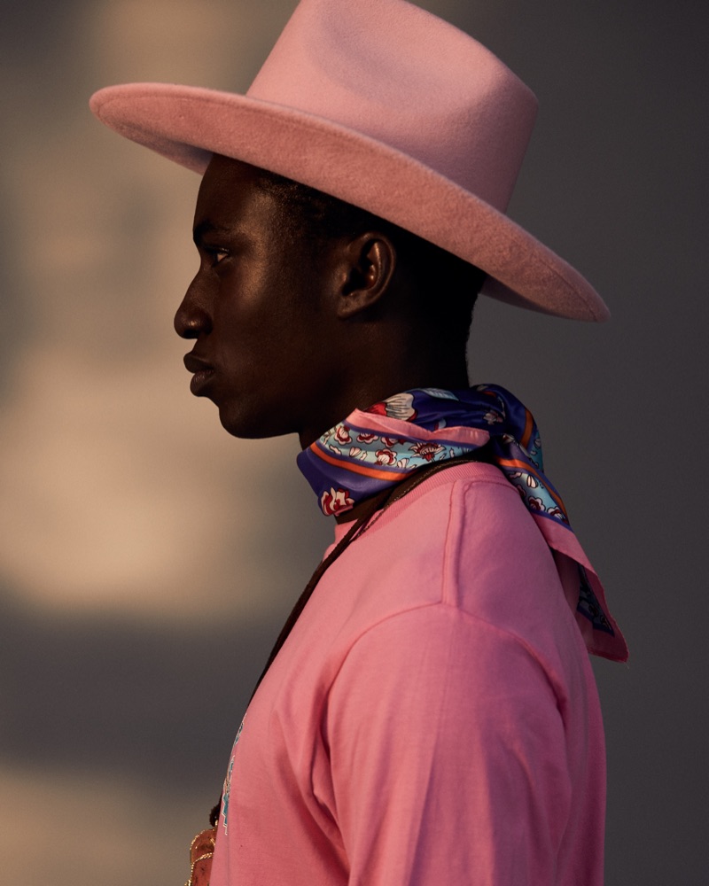 Fiifi wears t-Shirt Vans, scarf Zara, and hat Crystal Birch.