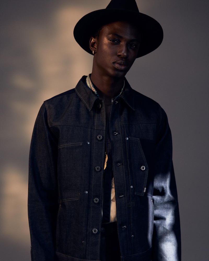 Fiifi wears jacket G-Star RAW, shirt Versace, and hat Crystal Birch.